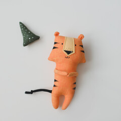 cute soft toy tiger - symbol of 2022, oriental calendar concept