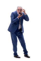 Old businessman talking by phone isolated on white