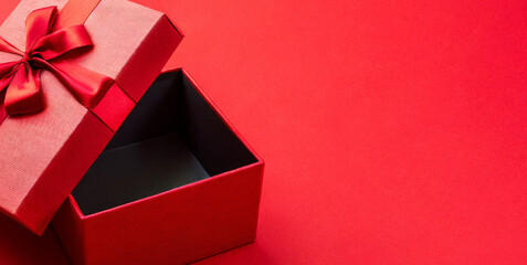 all red gift box concepts blank open present box or opening gift box with red ribbon bow iso - obrazy, fototapety, plakaty