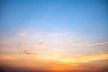 Beautiful of luxury soft gradient orange gold clouds and sunlight on the blue sky perfect for the...