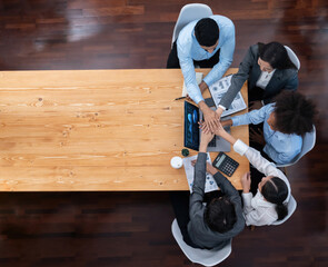 Top view panoramic banner hand stack by office worker show solidarity teamwork and trust in...