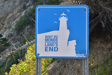 Blue sign indicating Land’s End location. Famous hiking trail in Forillon national Canada park.