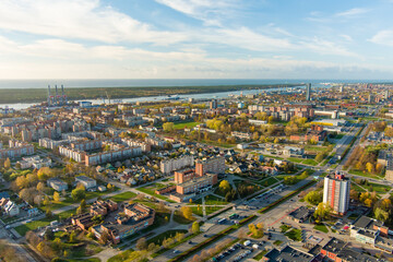 Aerial view of residential area of Klaipeda, Lithuania on sunny evening. Klaipeda city port area and it's surroundings on autumn day.