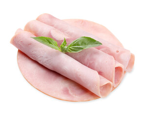 Rolled slices of tasty ham and basil isolated on white