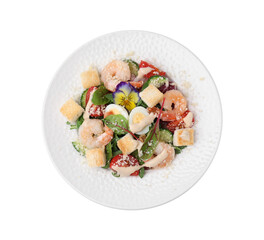 Plate of delicious Caesar salad with shrimps isolated on white, top view
