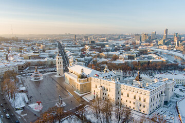 Beautiful sunny Vilnius city scene in winter. Christmas tree on the Cathedral square. Aerial early evening view. Winter scenery in Vilnius, Lithuania.