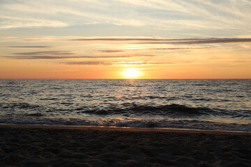 Obraz premium Picturesque view of sea at sunset. Tropical beach