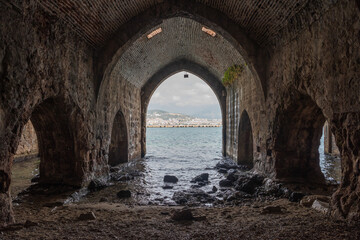 Stone arches of medieval Tersane shipyard in Alanya, Turkey.