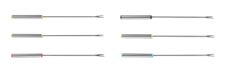 Set of fondue forks on white background