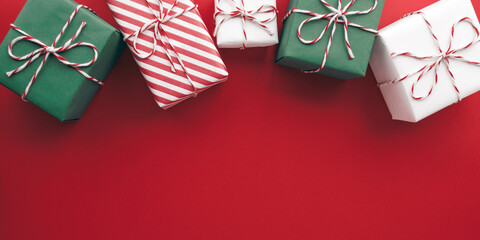Gift boxes on color background, flat lay, space for text