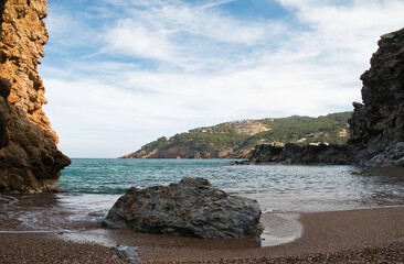 A view of the beach Cala Illa Roja in Begur, separated in two parts by a rock mass, on the Costa Brava, Catalonia, Spain.
