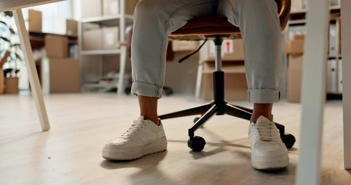 Anxiety, work and tapping feet at a desk for office stress, mistake or start of a new job. Low, legs and nervous shoes of an employee for fail, waiting or impatient while working in ecommerce