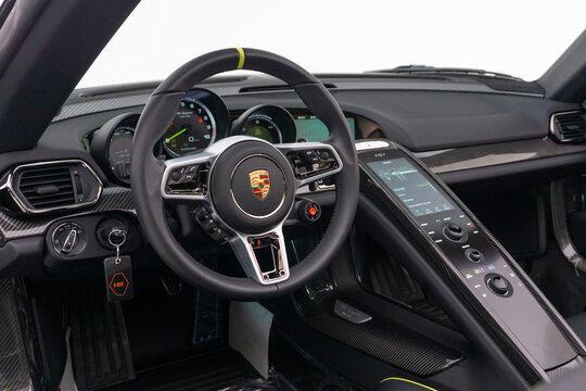 Porshce 918 Spyder dashboard view, car in studio, white background - High Resolution Image