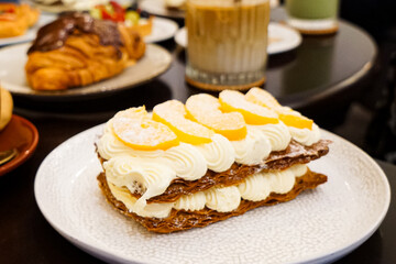 Cake, pastries and drinks on the table. Close up.