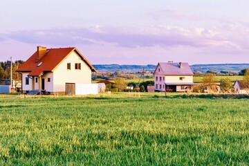 Houses in a small village on a hillside in the countryside