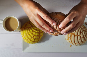 Hands of Mexican Hispanic woman. Concept of taking food with hands or handling food. Taking a...