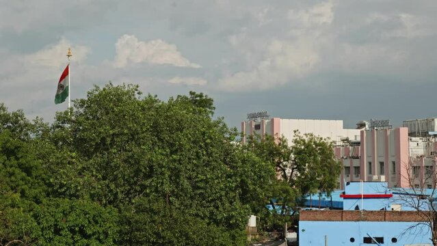 secunderabad railway station with flag and trees swaying  in the front