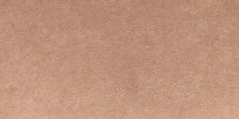 Beige recycled craft paper texture as background. Paper texture cardboard background. Grunge old paper surface texture.