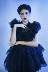 Cosplay girl in Wednesday Adams black dress