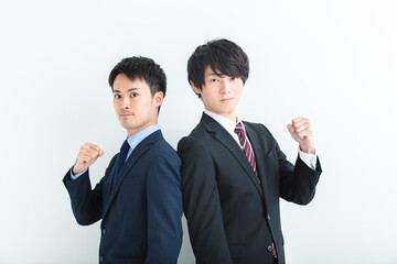 カメラ目線でガッツポーズする男性　Business