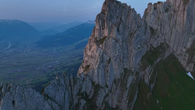 Drone footage over the rocky peak of the Altmann Mountain on the Alpstein Appenzell, Switzerland