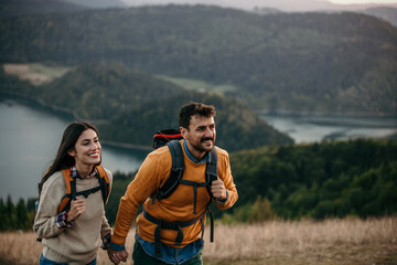 A heartwarming capture a loving couple, arms entwined, as they tenderly pack their backpacks after...