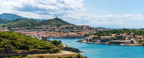 Panorama of Port-Vendres on a summer day, in the Pyrénées-Orientales in Catalonia, in the Occitanie region, France - obrazy, fototapety, plakaty