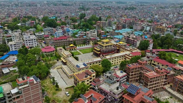 Shechen Monastery With Cityscape In Tushal-Mahankal Road, Kathmandu, Nepal. Aerial Wide Shot