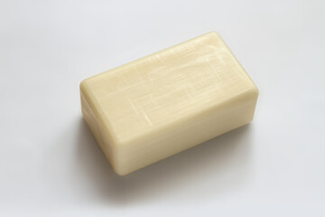 A bar of natural soap on a gray background. Natural soap close-up.