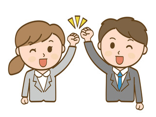 ガッツポーズで意気込むスーツ姿の女性会社員と男性会社員