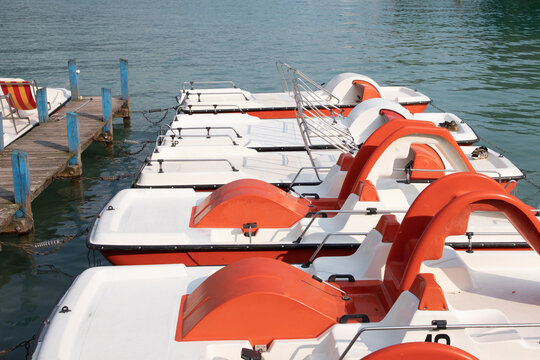 pedal boat and slide on lake beach pontoon