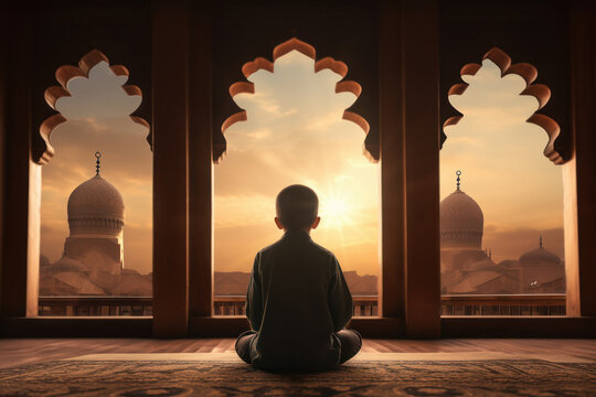 little muslim boy praying in the mosque