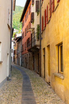 Beautiful Old Narrow Street with Old Building with Sunlight in Bissone, Ticino, Switzerland.