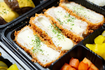 Cheese pork cutlet on a plate