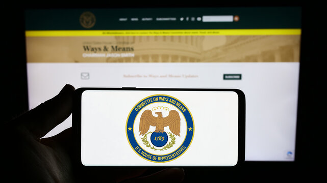 Stuttgart, Germany - 09-27-2023: Person Holding Smartphone With Seal Of United States House Committee On Ways And Means In Front Of Website. Focus On Phone Display.