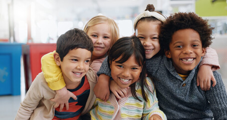 Portrait, group and kids with smile at school for education, learning and knowledge with hug....