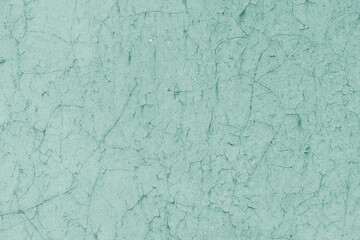 Old cracked paint on fence closeup. Texture, grunge texture, old cracked paint on fence close-up