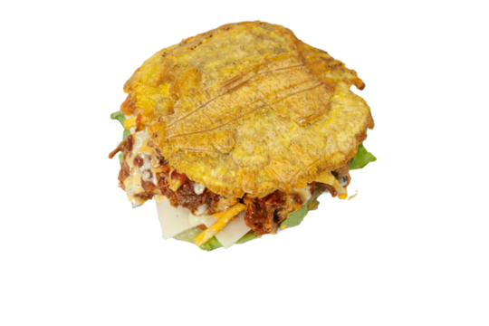 patacón or toston fried green plantain with shredded meat and tomato sauce