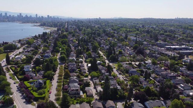 Aerial footage over Kitsilano panning to the right to show the rows of single family homes