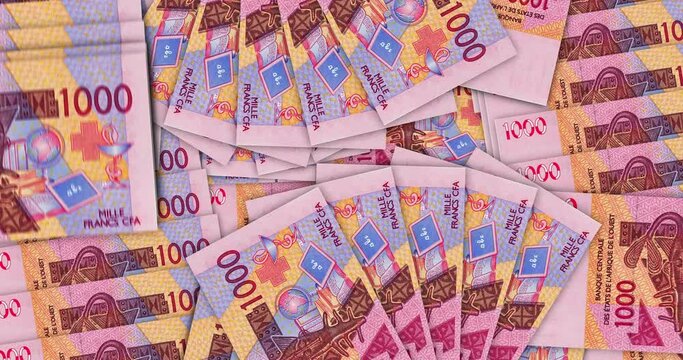 West African CFA money Franc Niger Mali Senegal Africa banknotes in a cash fan mosaic pattern loop XOF notes. Abstract concept of bank, economy seamless and looped decorative design background.