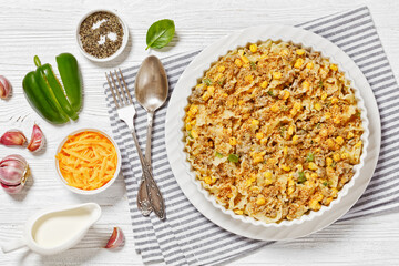 Creamy Corn Casserole with Sausage in baking dish