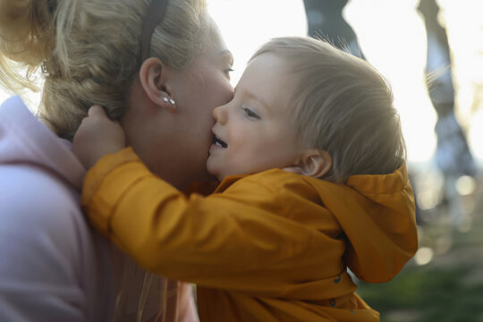 Unconditional Love: A Mother and Her Little Boy Embrace