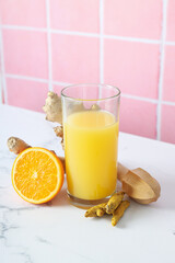Concept of healthy liquid - ginger turmeric drink