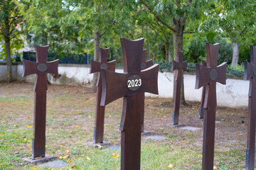old iron grave crosses in cemetery, funeral 2023, beginning something important, end bad period...