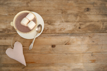 cup with drink coffee cappuccino, hot chocolate, marshmallows, garlands, winter clothes, caffeine...