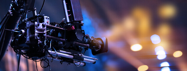TV camera on a crane at a football match or concert. Close-up live video broadcast camera - obrazy, fototapety, plakaty