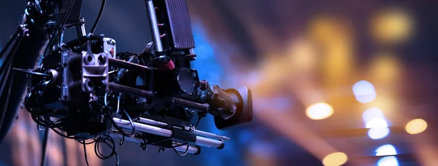 Fotobehang TV camera on a crane at a football match or concert. Close-up live video broadcast camera © Natallia