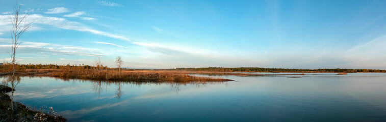 Fototapeta premium Panorama lake view in sunrise time .Sunrise at the lake