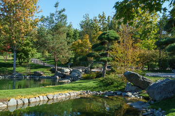 Fototapeta na wymiar Japanese garden in Public landscape park of Krasnodar or Galitsky park, Russia