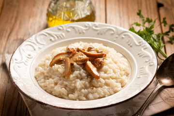 Rice with cep, traditional italian recipe - 664867899
